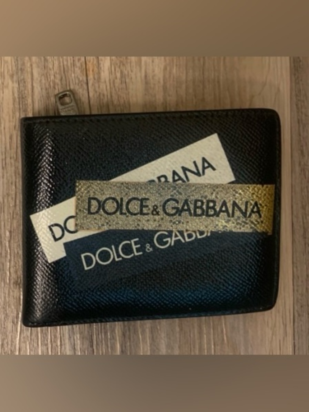 Dolce and
Gabbana Black and Gold Logo
Tape Bifold Wallet w/ Free COA EUC